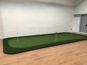 Three-hole indoor putting green with Ultra-base panels