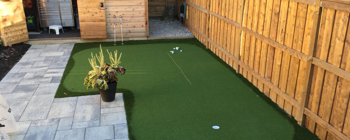 Off patio golf green keeps the backyard open for kids